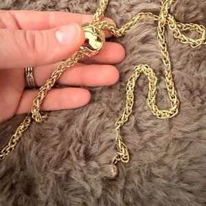 Gold colored adjustable shoulder chain